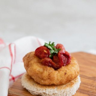 Medallón de merluza con pimientos asados